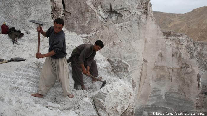 people working in a lithium mine in Afghanistan